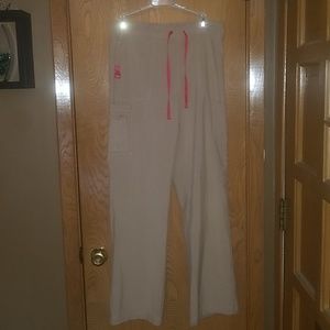 Tan and pink Carhartt scrub pants
